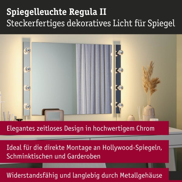 Spiegelleuchte Regula II aus Chrom, zwei vertikale Lichtleisten mit je vier Lichtern an einem Spiegel auf einem weißen Schminktisch.