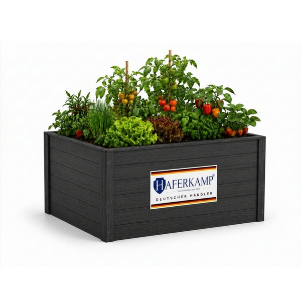 Anthrazitfarbenes Hochbeet aus WPC, bepflanzt mit Tomaten, Salat und verschiedenen Kräutern.
