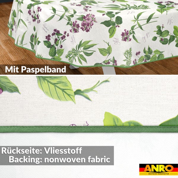 Tischdecke mit botanischem Muster, Paspelband am Rand und Vliesstoff auf der Rückseite. ANRO DEUTSCHE MANUFAKTUR Logo.