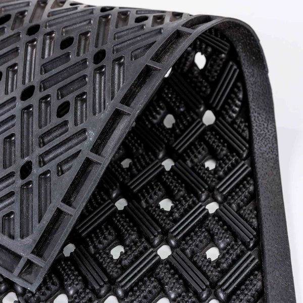 Schmutzfangmatte aus Gummi mit Löchern und Rillen