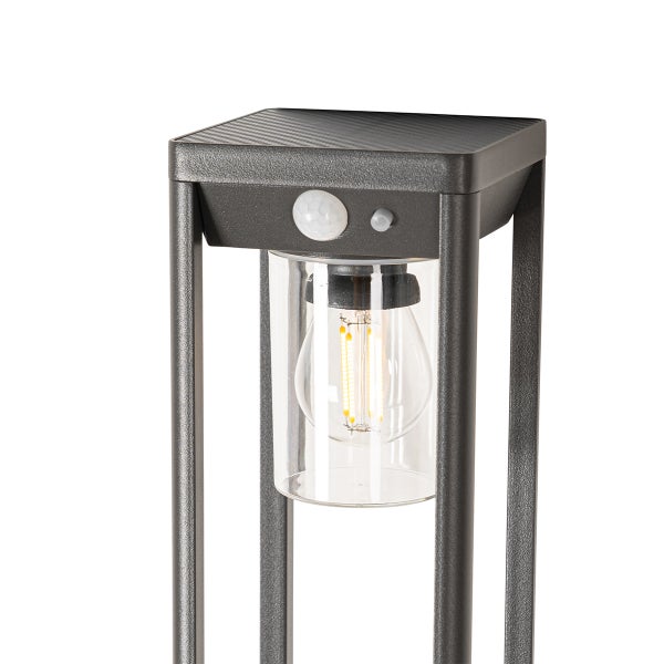 Moderne Solar-Wegeleuchte mit Bewegungsmelder, integriertem Solarpanel und LED-Filament-Leuchtmittel in einem anthrazitfarbenen Metallrahmen.