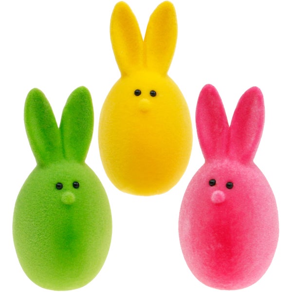 Drei dekorative Osterhasenfiguren