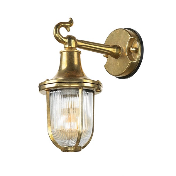 Messingfarbene Wandleuchte mit klarem Glas