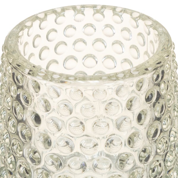 Windlicht aus grauem Glas mit Noppenstruktur.