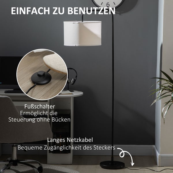 Stehleuchte mit Fußschalter und langem Netzkabel in einem Arbeitszimmer.