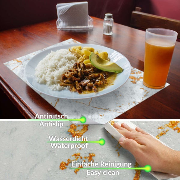 Platzset in Marmor-Optik mit Goldadern auf einem Holztisch, rutschfeste, wasserdichte und leicht zu reinigende Oberfläche.