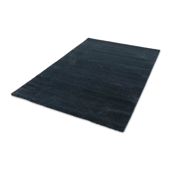 Rechteckiger Hochflor-Teppich in Dunkelblau mit weicher Textur.