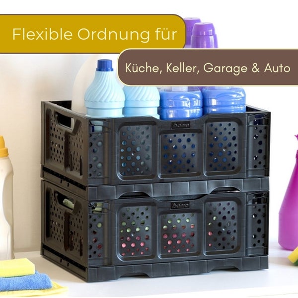Zwei gestapelte schwarze Kunststoffklappkisten zur Organisation von Reinigungsmitteln in Küche, Keller oder Garage.