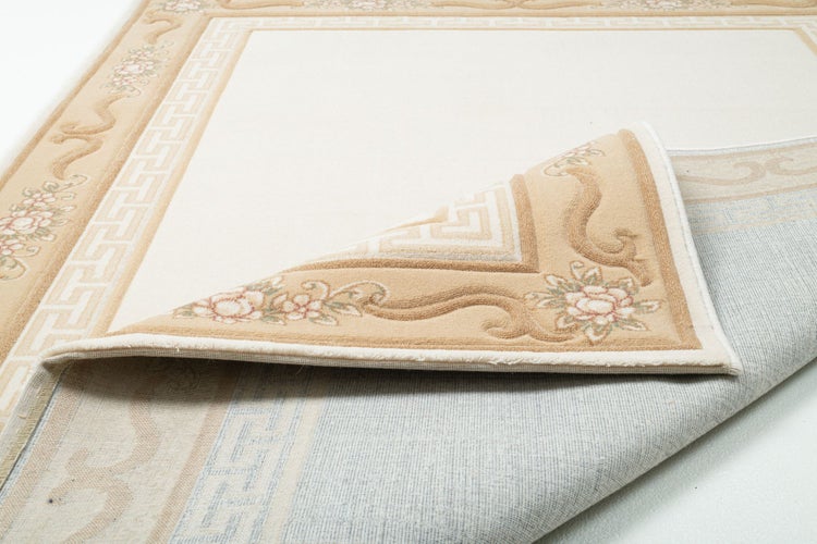 Gewebter Wollteppich mit Bordüre Pelinia Beige 40x60 cm