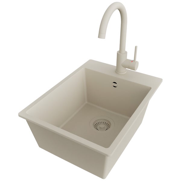 Spültisch aus Stein mit Wasserhahn