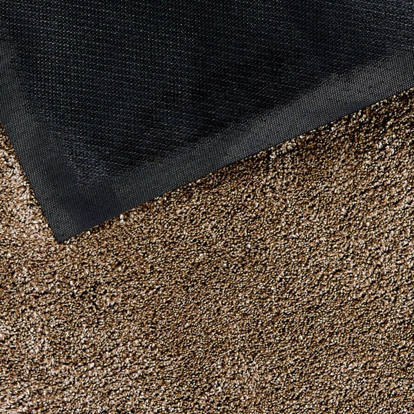 Detailansicht eines Teppichs mit Teppichunterlage