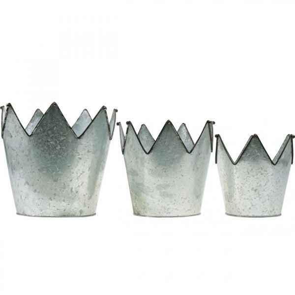 Drei Blumentöpfe in Kronenform aus Metall