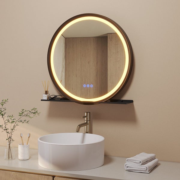 Runder LED Badezimmerspiegel mit integrierter Ablage und Touchbedienung über einem runden Aufsatzwaschbecken im Badezimmer