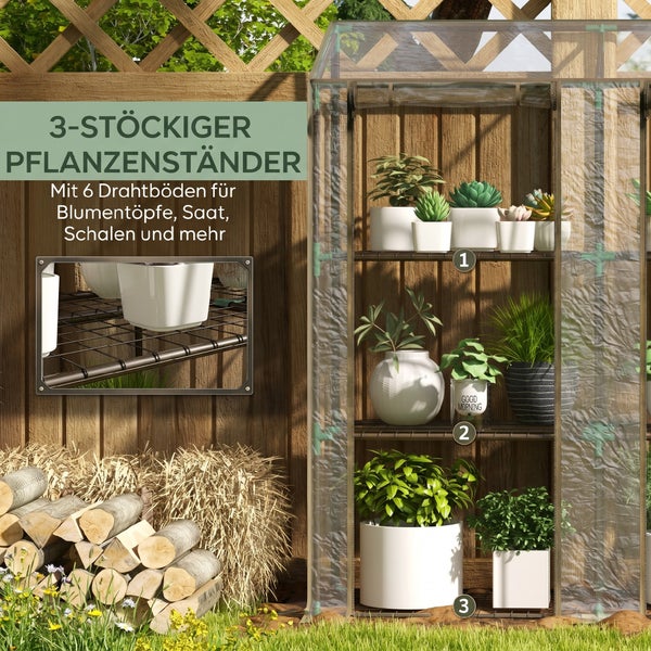 Dreistöckiges Pflanzenregal als Gewächshaus mit sechs Drahtböden für Pflanzen und Töpfe im Garten vor einem Holzzaun mit Holzstapel.