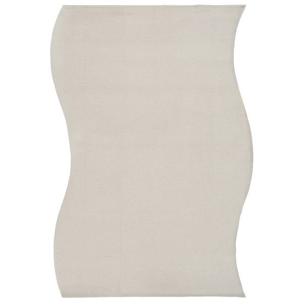Wellenförmige Badematte aus weichem Textil in Beige.