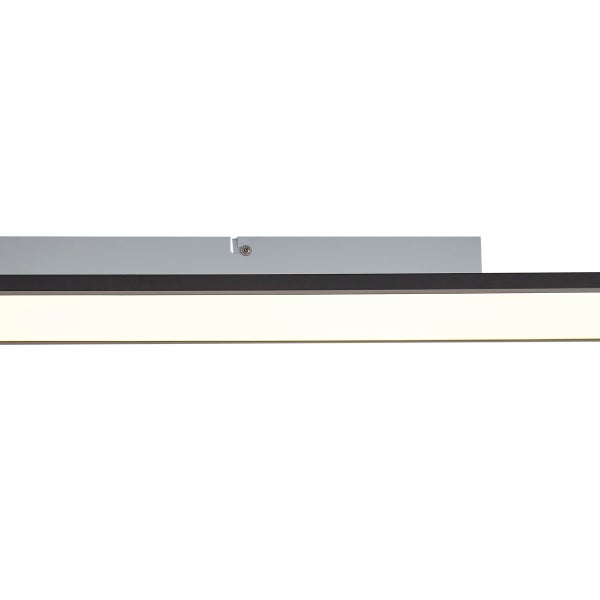 Nahaufnahme einer linearen LED-Leuchte mit grauem Sockel und schwarzem Gehäuserahmen.