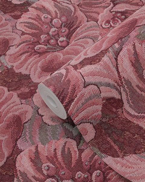 Eine Rolle Tapete mit einem Blumenmuster.