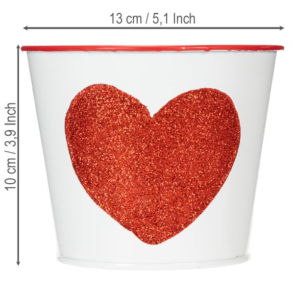 Weißer Blumentopf mit rotem Glitzerherz und rotem Rand, Höhe 10 Zentimeter, Breite 13 Zentimeter.