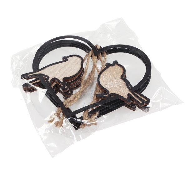 Dekorative Holzanhänger in Herzform mit Vogelmotiven, verpackt