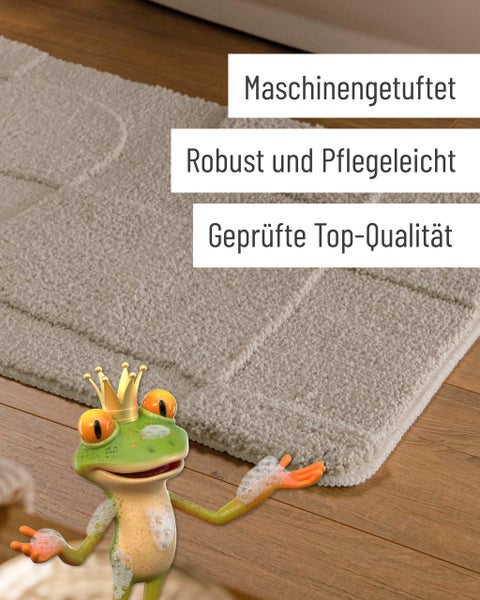 Eingerollte beige Badematte aus weichem Material mit strukturierter Oberfläche.