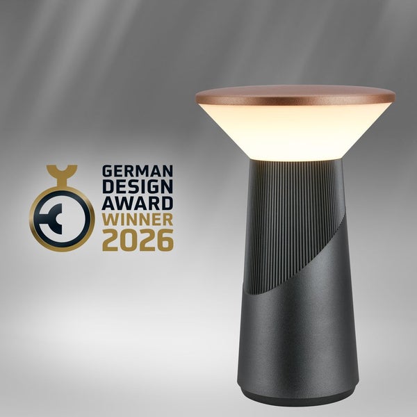 Moderne LED-Tischleuchte für außen in Anthrazit mit kupferfarbenem Deckel und Auszeichnung German Design Award Winner 2026.