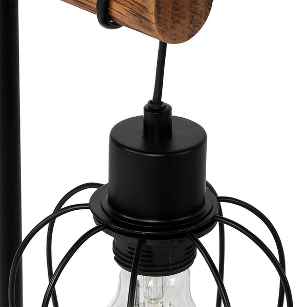 Detailansicht einer Lampe mit Holzelement und schwarzem Lampenschirm