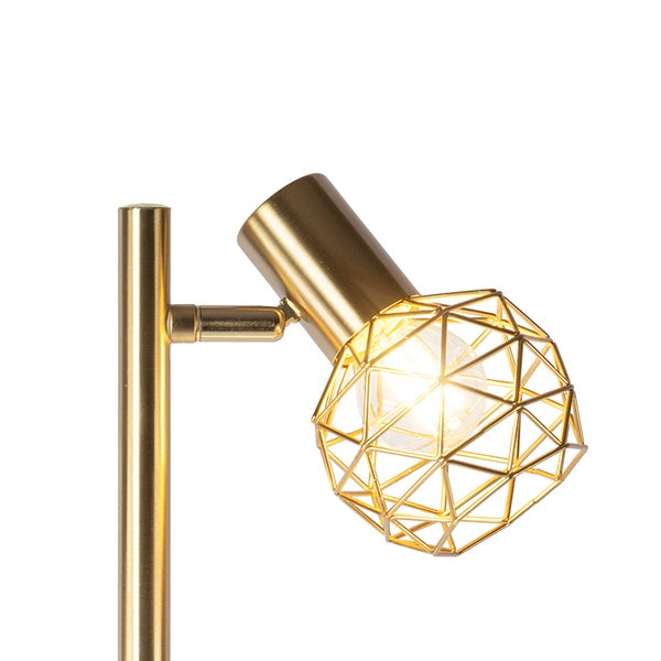 Goldfarbene Stehlampe mit geometrischem Lampenschirm