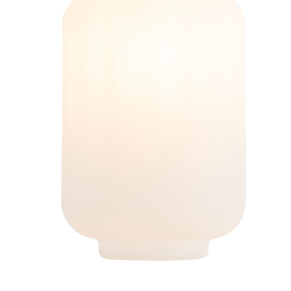 Zylinderförmiger Lampenschirm aus mattem Glas mit abgerundeten Kanten und schmalem Sockel.
