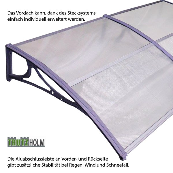 Trutzholm Haustürvordach aus Kunststoff mit Aluminiumabschlussleisten und Stecksystem zur individuellen Erweiterung.