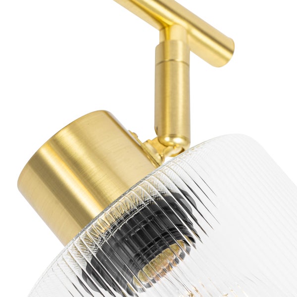 Detailaufnahme einer Wandleuchte aus Glas und Metall