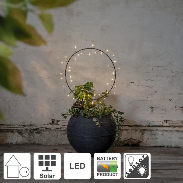 Dekorative Solarleuchte in einem Blumentopf mit LED Lichtern.