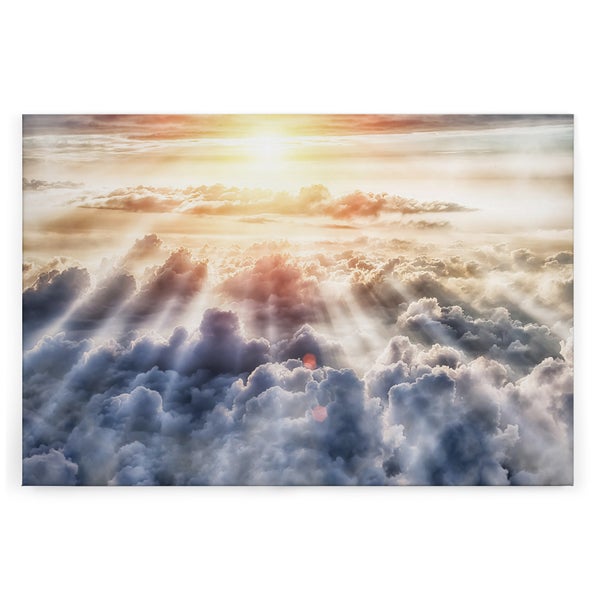 Wandbild mit Motiv von einer Wolkenlandschaft bei Sonnenuntergang und durchscheinenden Sonnenstrahlen