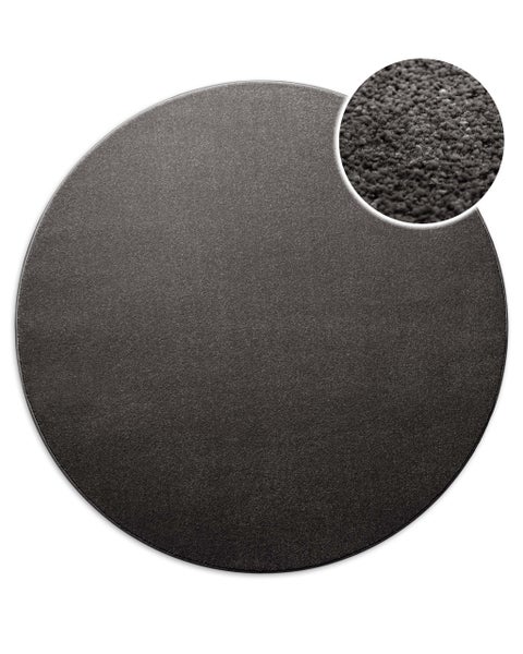 Runder Teppich, anthrazit, strukturierte Oberfläche.