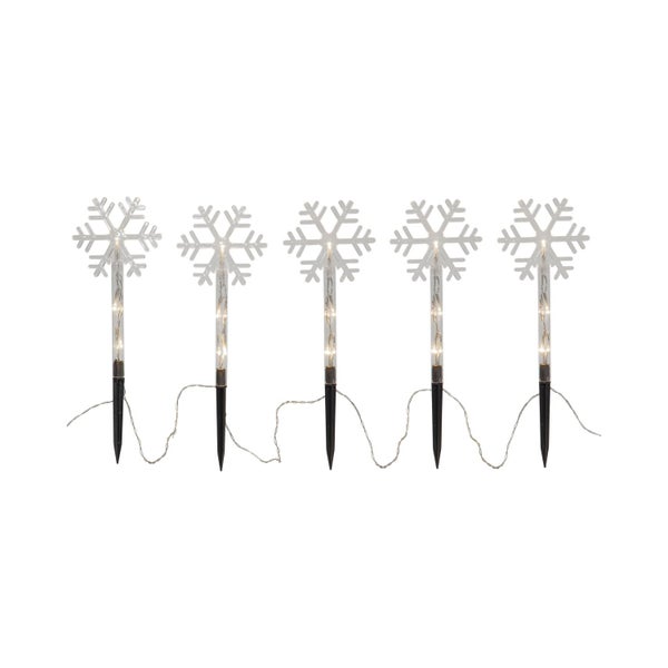 Fünf Schneeflocken-Gartenleuchten auf Erdspießen