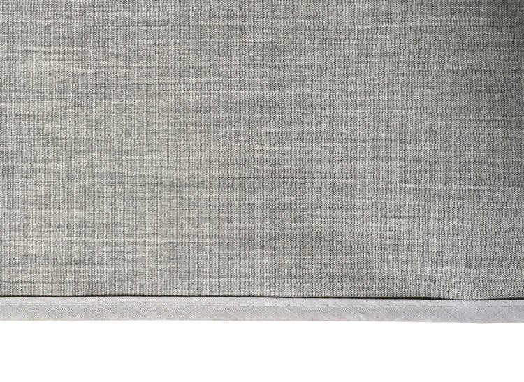 Nahaufnahme des Stoffes eines Dekokissenbezugs