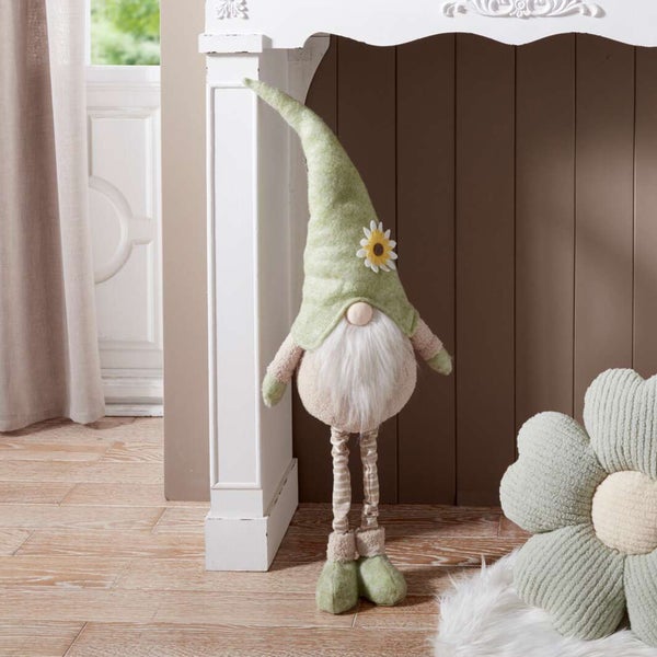 Dekorativer Zwerg mit Mütze und Sonnenblume als Dekoration