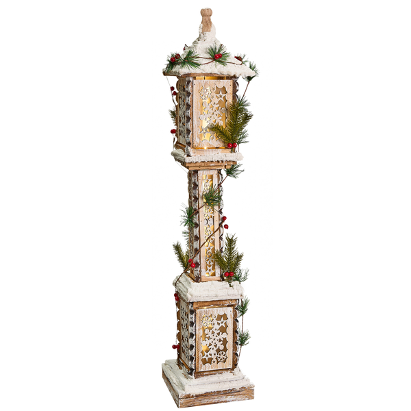 Dekorative Weihnachtsleuchte mit Schneeflockenmuster, Tannenzweigen und roten Beeren als festliche Dekoration