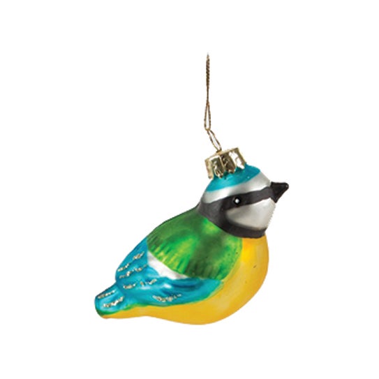 Kinderzimmer mit Waldtapete, Gitterbett und Korb