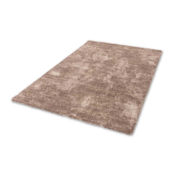 Rechteckiger Hochflor-Teppich Shaggy mit weicher Struktur.