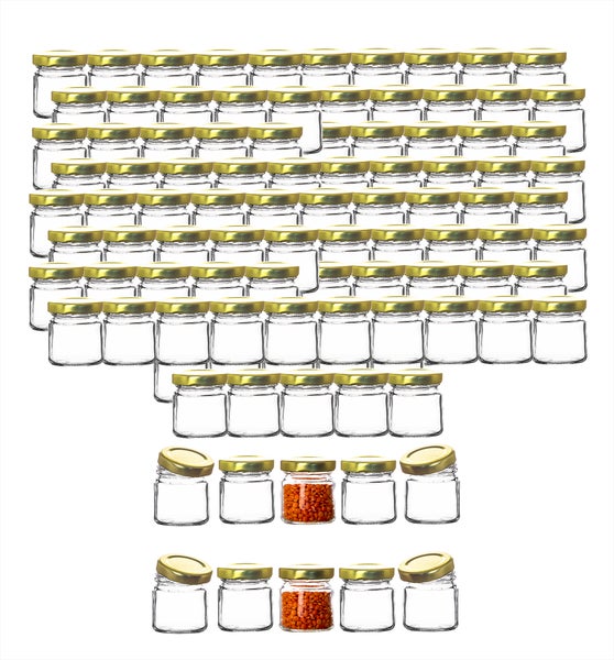 Viele leere Einmachgläser mit goldenen Deckeln