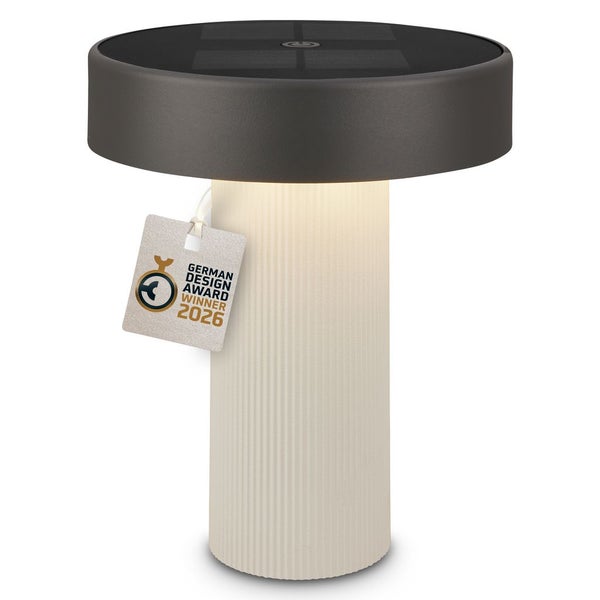 Solar-Tischleuchte mit dunkler, runder Oberseite und hellem, vertikal geriffeltem Sockel, Gewinner des German Design Award 2026.