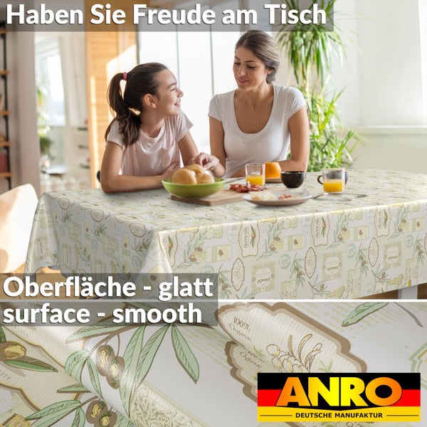 Abwaschbare Tischdecke mit Olivenmuster und glatter Oberfläche in einer hellen Wohnküche mit Frühstücksszene. ANRO Logo.