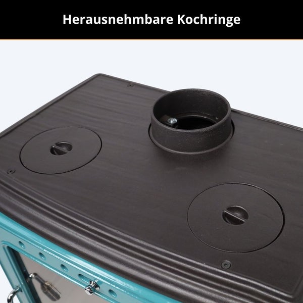 Herausnehmbare Kochringe und Rauchrohranschluss auf einer Ofenplatte aus Gusseisen.