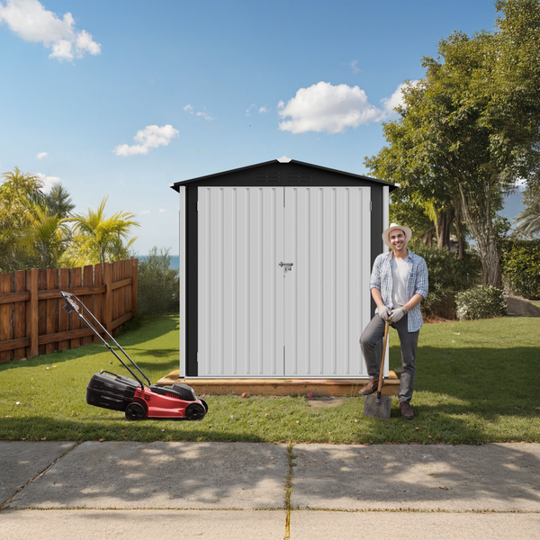 Gartenszene mit Gerätehaus, Rasenmäher und Gärtner