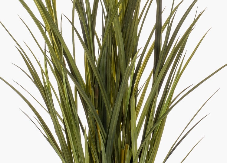 Künstliche Monstera Deliciosa Variegata mit weiß panaschierten Blättern im schwarzen Topf.