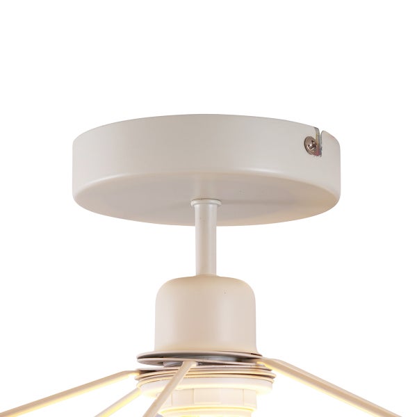 Deckenbefestigung einer runden Pendelleuchte aus Metall in Beige mit sichtbarer seitlicher Schraube.