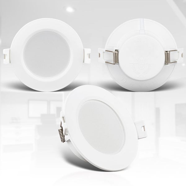 Runder LED-Einbaustrahler in Weiß, Ansichten von vorne, hinten und schräg mit Montagefedern.