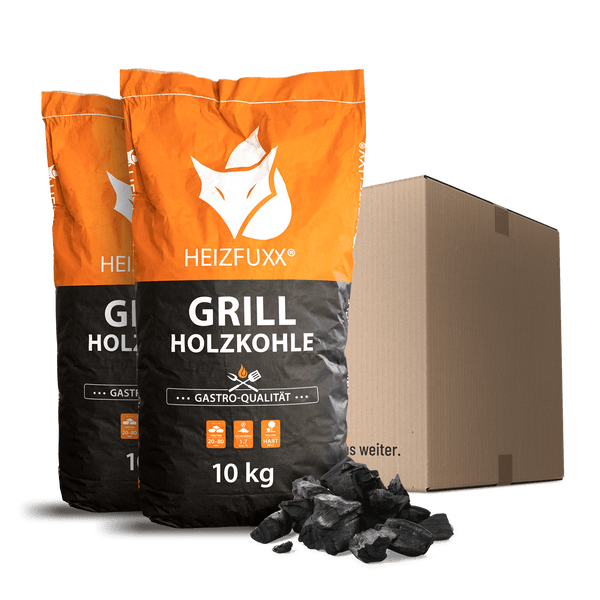 Zwei 10 Kilogramm Säcke HEIZFUXX Grill-Holzkohle, Gastronomie-Qualität, Hartholz, HEIZFUXX Logo, mit Versandkarton und losen Holzkohlestücken.