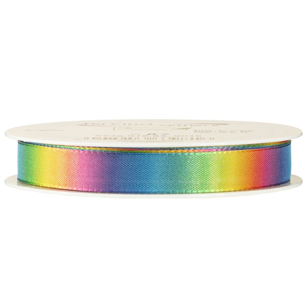 Dekoratives Geschenkband mit Regenbogenfarben auf einer Spule.