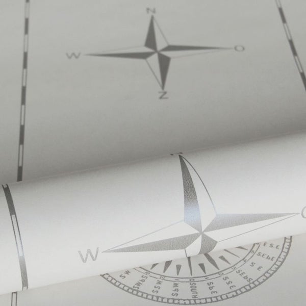 Tapetenrolle mit Kompass-Motiv